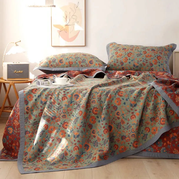 Cotton gauze bed blanket set with floral pattern including blanket and two pillowcases