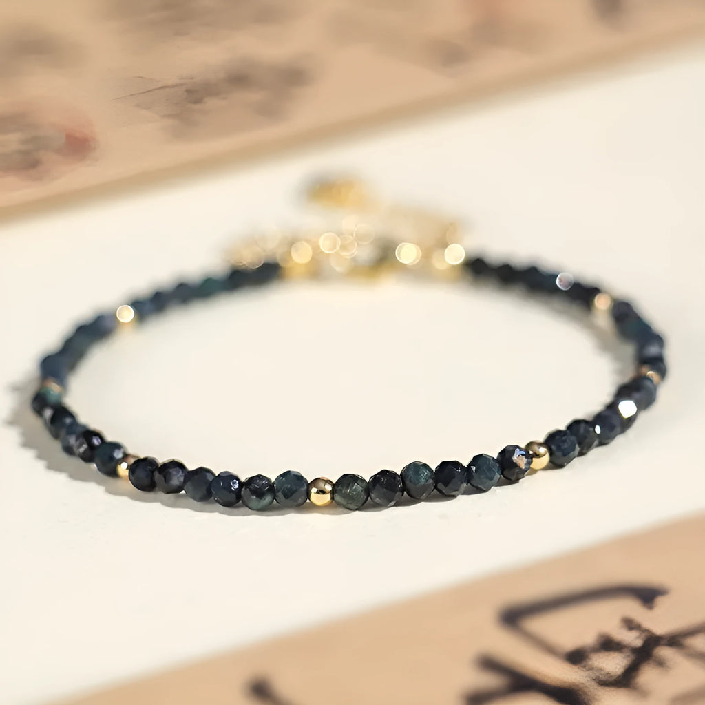 Blue tourmaline beaded bracelet with 3mm stones and silver spacer beads