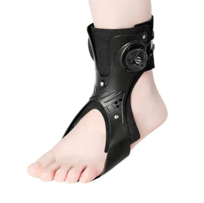 Grey ankle support brace showing airbag button system and hook-and-loop fastening for adjustable compression