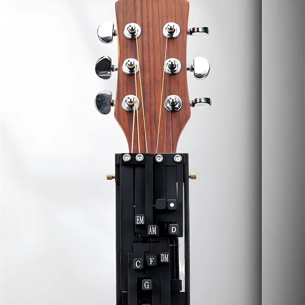 Automatic chord practice device for folk guitar, shown in black, designed for novice second chord training.