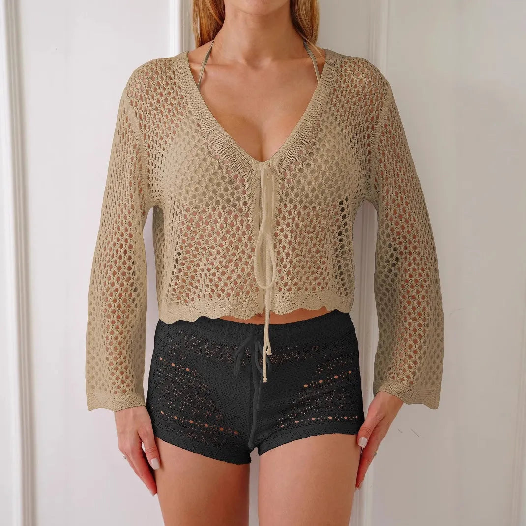 Women's hollow woven cardigan blouse with bell sleeves in short length available in four solid colours