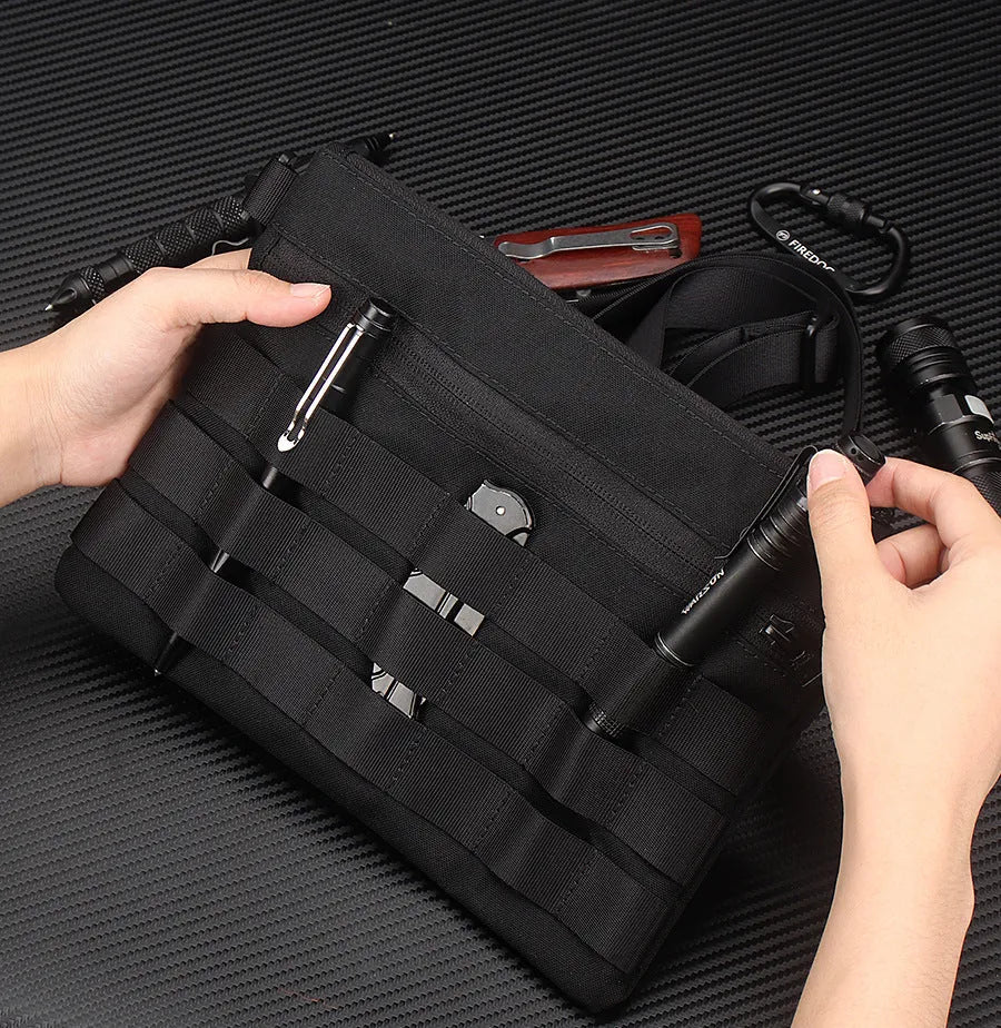 Black tactical waist pack made from Oxford cloth measuring 18cm by 3.5cm