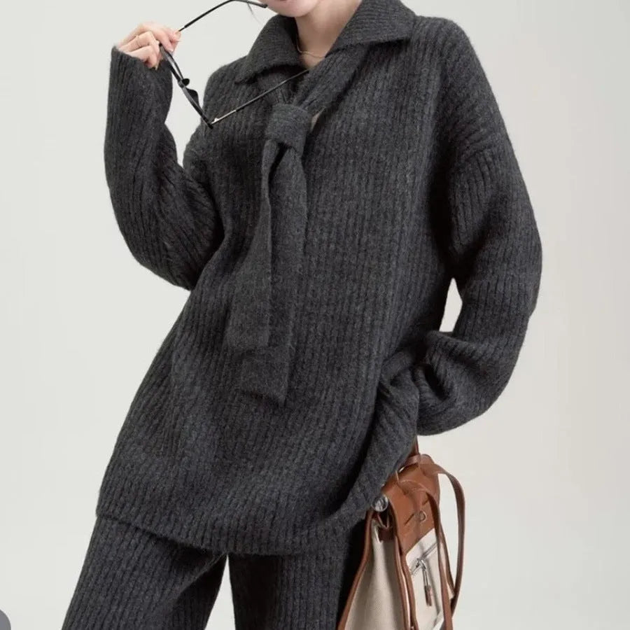 Ladies elegant knit sweater suit two-piece set in imitation cashmere, showing top and trousers in beige.