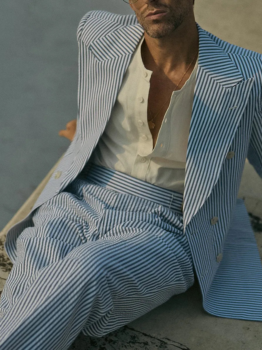 Blue and white striped two-piece polyester suit set with regular fit blazer and trousers