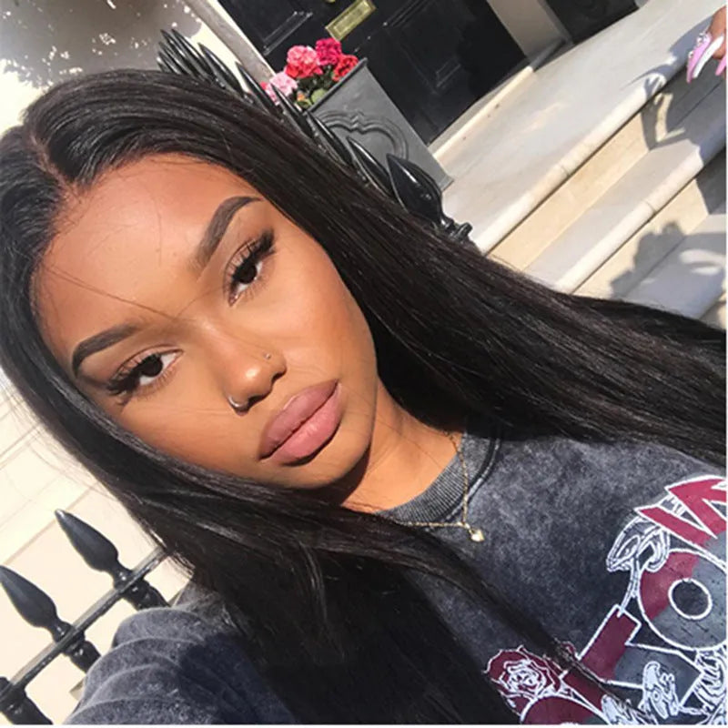 Women's long black straight synthetic wig with centre-parted bangs.