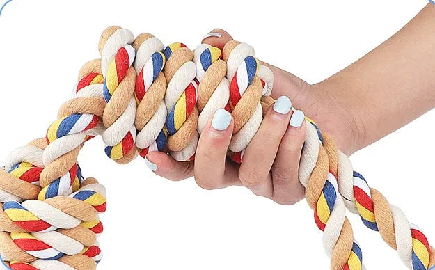 Pet bite rope dog chew toy made from cotton rope, 60 cm length, on light background