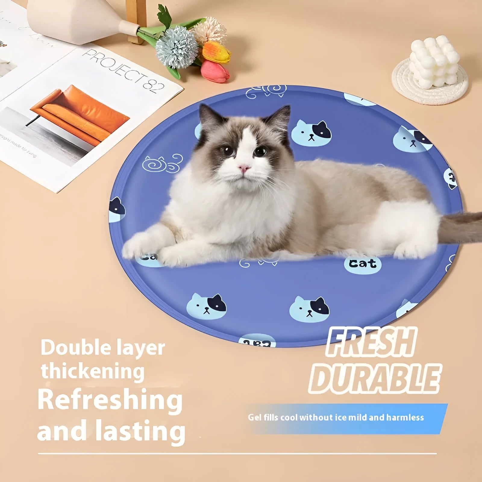 Round pet cooling mat with blue polar bear cartoon design on soft cloth fabric for dogs.