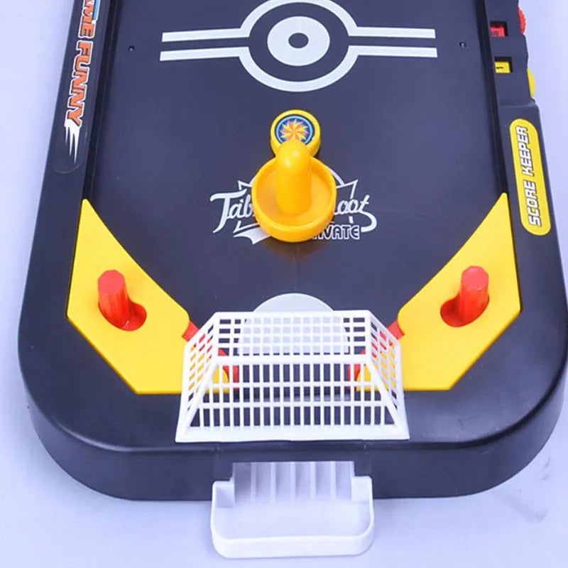 Desktop hockey table with goals, sticks, and balls for children's air hockey game