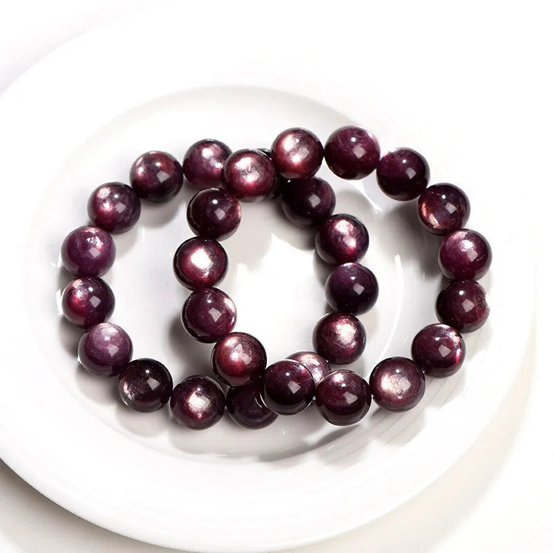Purple lepidolite crystal bracelet with round polished beads, showing five different bead size options.