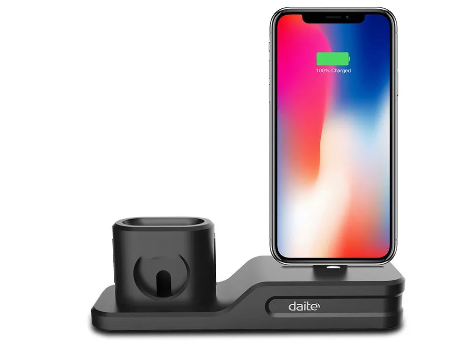 Black silicone 3-in-1 charging base for iPhone, iWatch, and AirPods on a plain surface