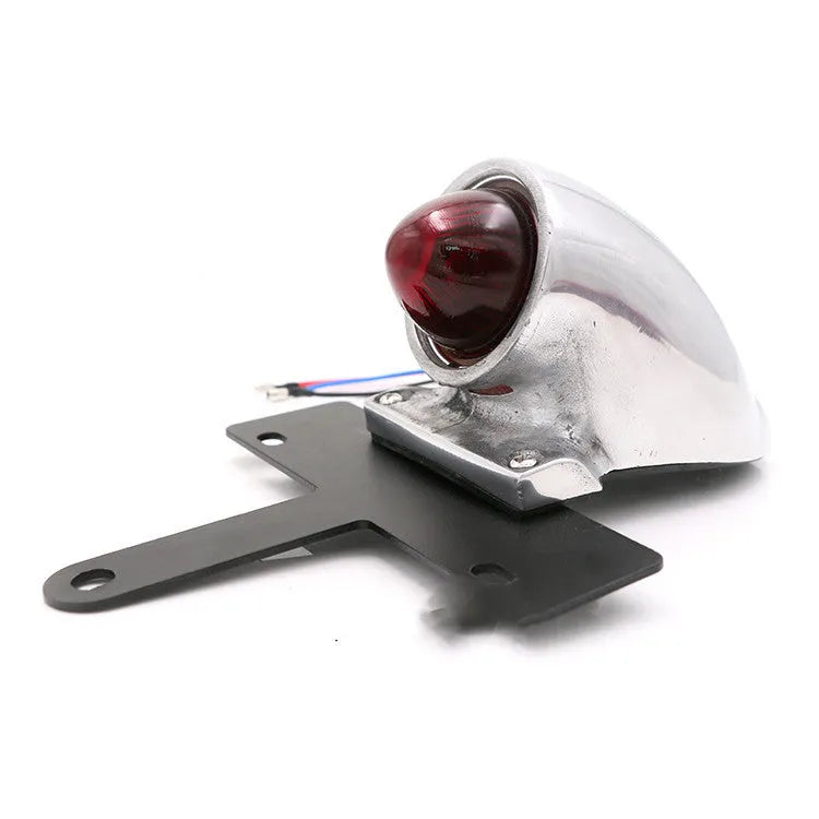 Silver aluminium alloy Lucas-style motorcycle taillight brake light with red lens and 36cm cable on white background