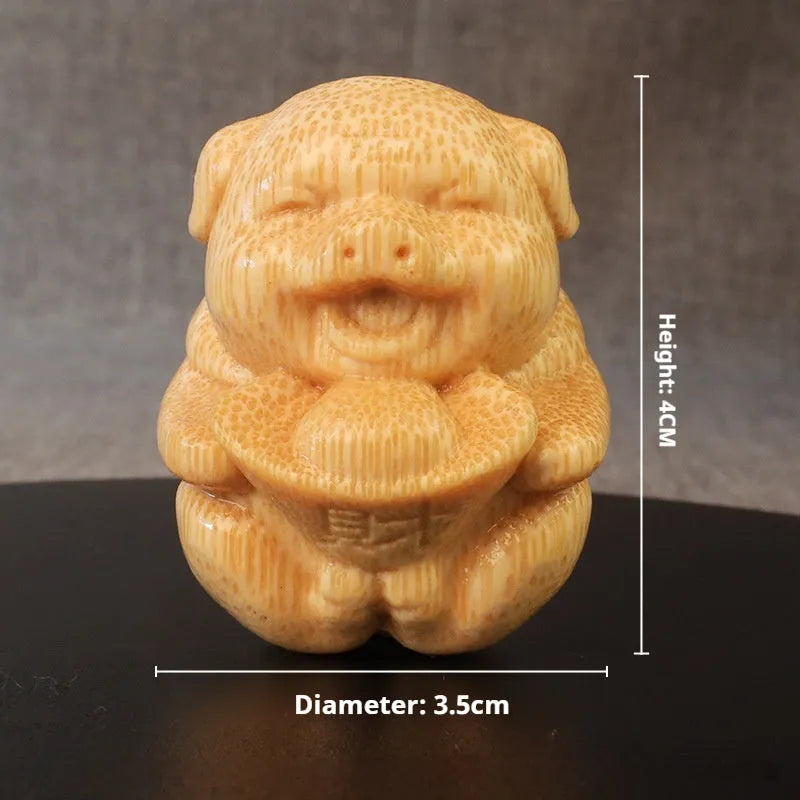 Solid bamboo carving Fulu pig ornament measuring 4cm tall with 3.5cm diameter