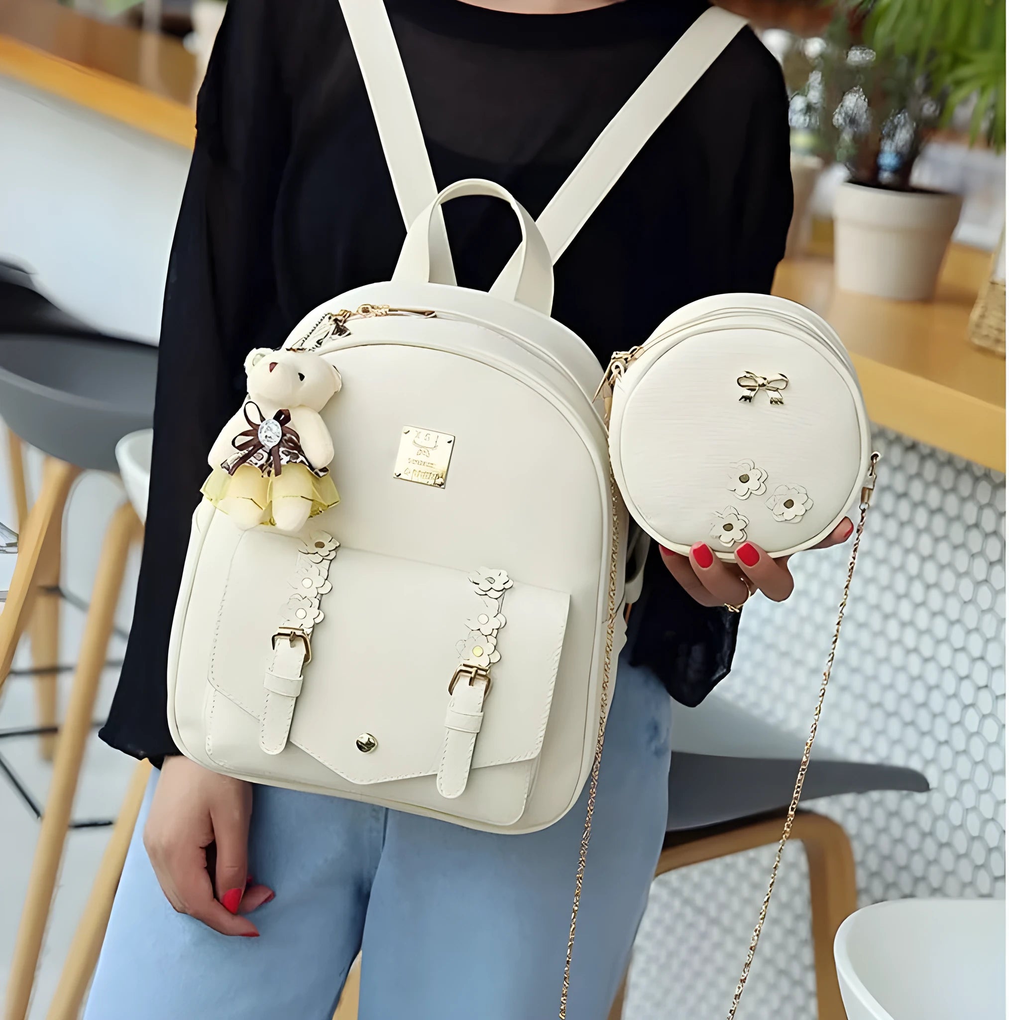 Women's 3-piece floral leather bag set showing backpack, shoulder bag, and card purse
