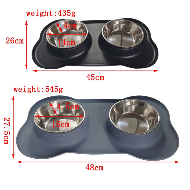 Large silicone double dog bowl in blue with two compartments for food and water on a kitchen floor.