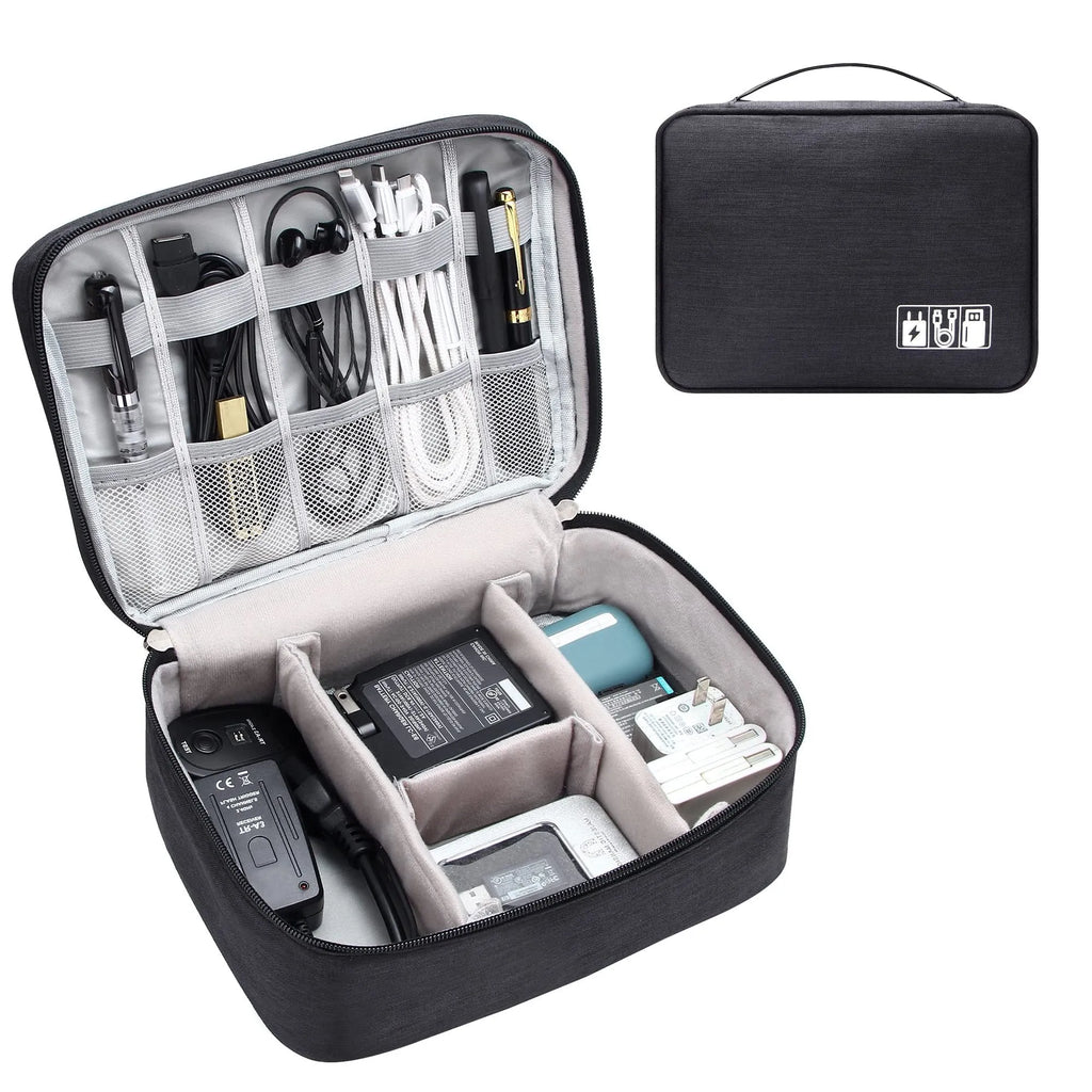 Black waterproof travel cable organiser bag open, showing mesh pockets, elastic loops, and removable padded dividers.