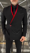 Black fake double-layered jacket with red interior and front chain detail worn casually