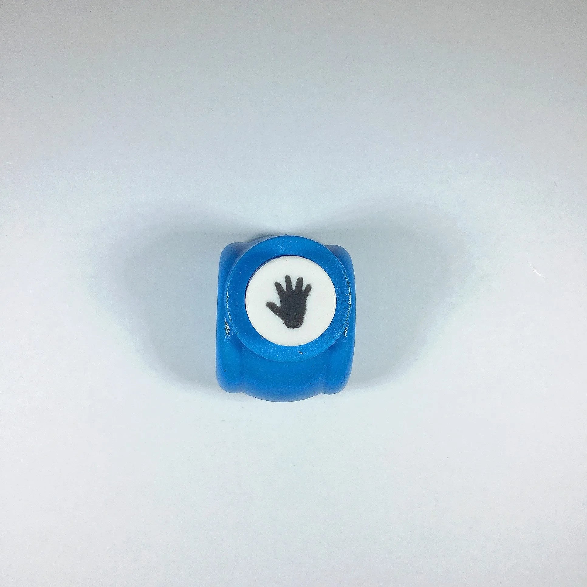 Plastic student stationery embossing device 3x2.5x3cm with decorative pattern