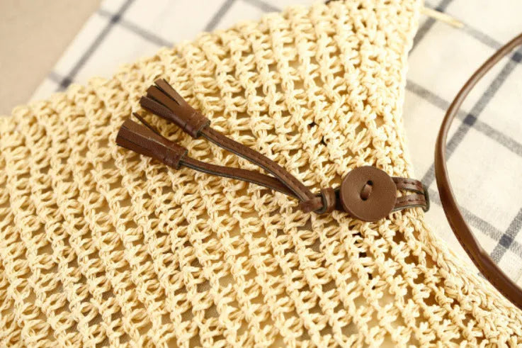 Handmade crochet crossbody straw bag for children in khaki with cotton lining and woven texture
