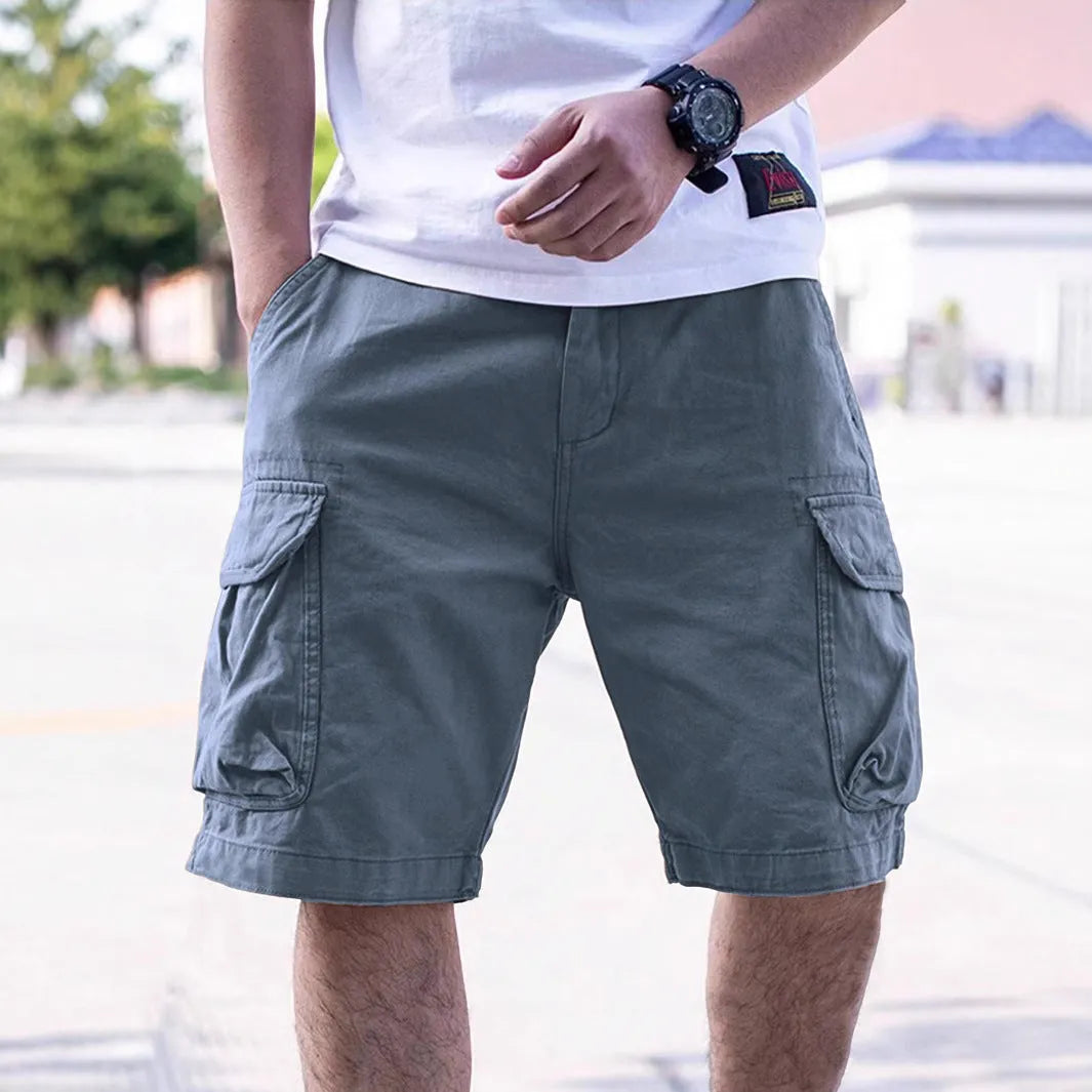 Men's loose fit cotton workwear shorts in Army Green colour showing retro style summer design