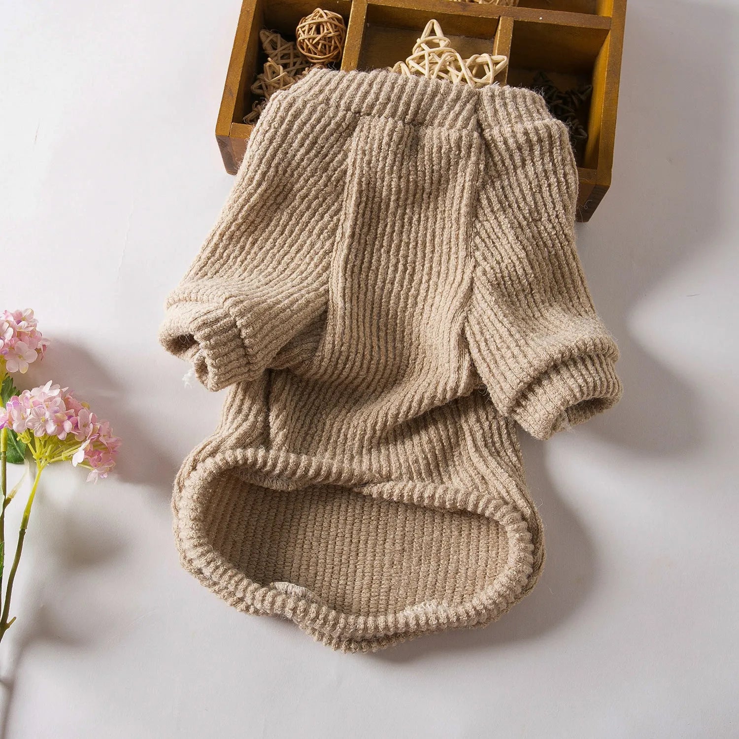 Brown cloth dog sweater pullover on a small dog, showing casual fit.