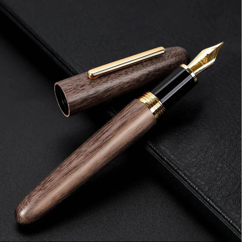 Wooden fountain pen with rotating cap shown in various wood finishes including rosewood and ebony.