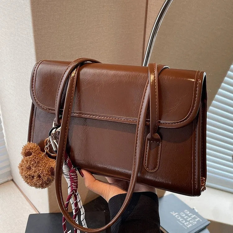 Women's brown Maillard PU leather shoulder bag with double straps and pendant attachment