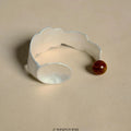 Small round spoon stewed pork ring and bracelet matching jewellery set with diamond-shaped charm