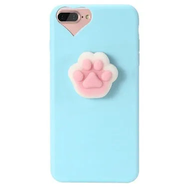 Soft silicone iPhone case with a raised 3D cartoon cat design in pink.