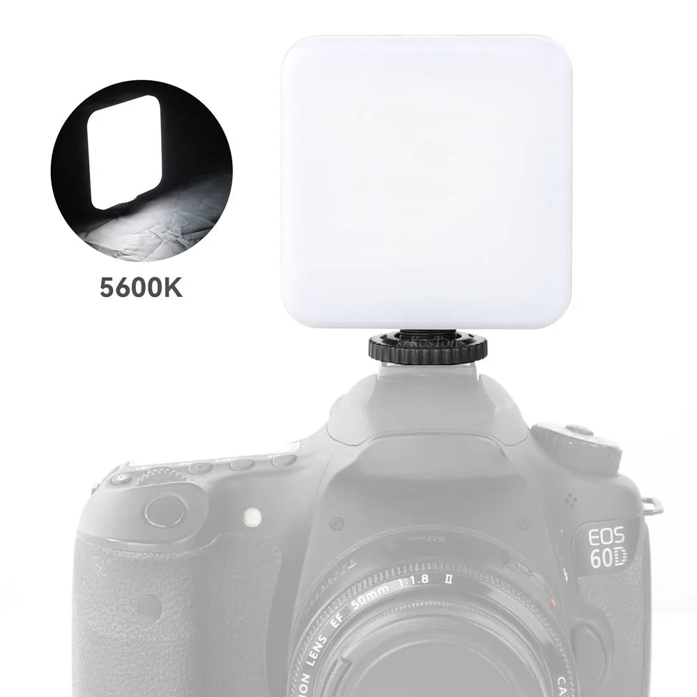 Universal LED mini square camera flash with rotatable head on a tripod stand.