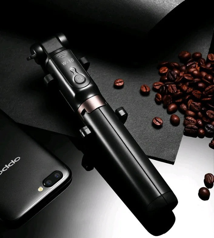 Aluminium alloy Bluetooth selfie stick with remote control and adjustable phone clip in black, pink, or white.