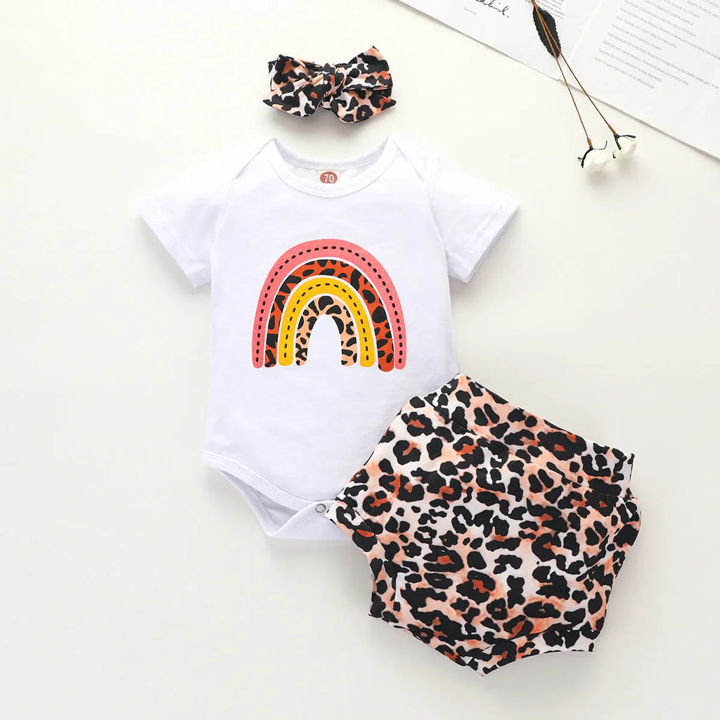 Girls' cotton rainbow romper set in beige with short sleeves and shorts, three-piece outfit on plain background