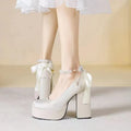 Women's chunky heel platform pumps in wine red with PU upper and rubber sole