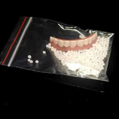 Silicone simulation dentures for dental training with upper and lower teeth in colour box packaging