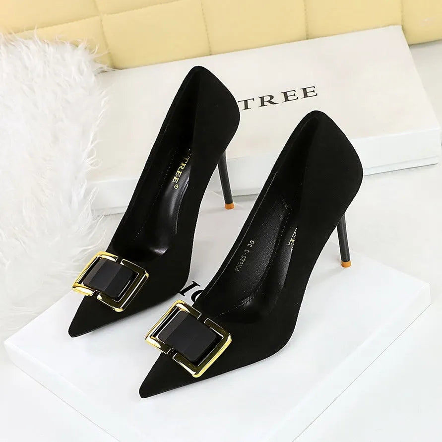 Black suede women's high heels with 9cm stiletto heel and pointed toe design on rubber sole