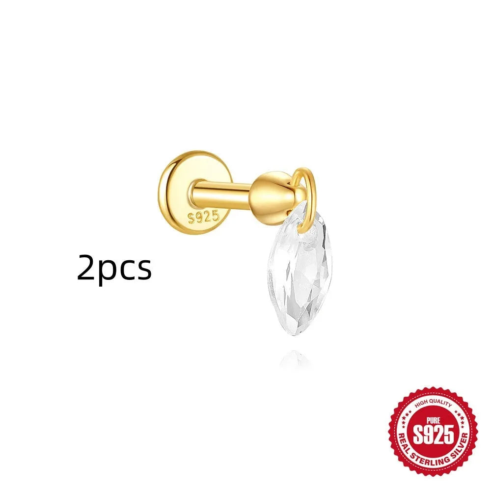 S925 sterling silver geometric kite earring with rhinestones and a chain tassel in a gold colour.