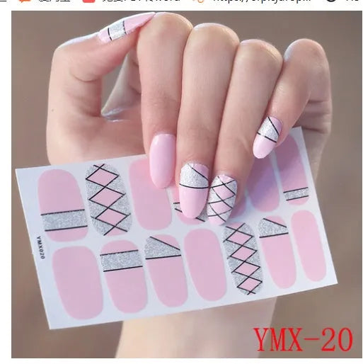 Full nail stickers set of 14 sheets showing 16 colour options in a flat lay arrangement