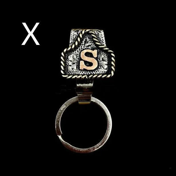 Handmade metal cow tag belt keychain in a selected colour from the A-Z letter range.