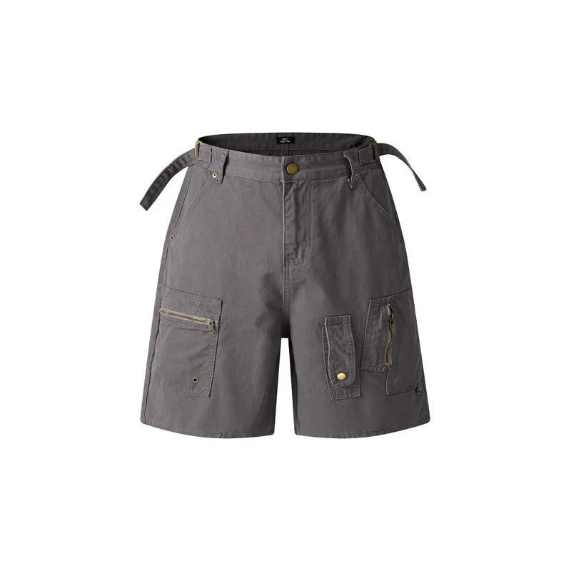 Retro loose-fit washed cotton workwear shorts for men and women in camouflage colour with a zipper fly.