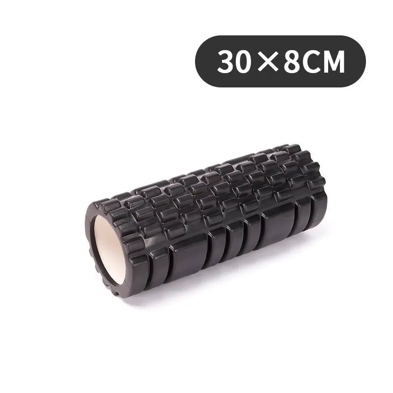 EVA foam roller for fitness in various colours and sizes on a gym floor.