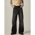 Black loose-fit straight-leg men's jeans with a zipper fly and retro styling.