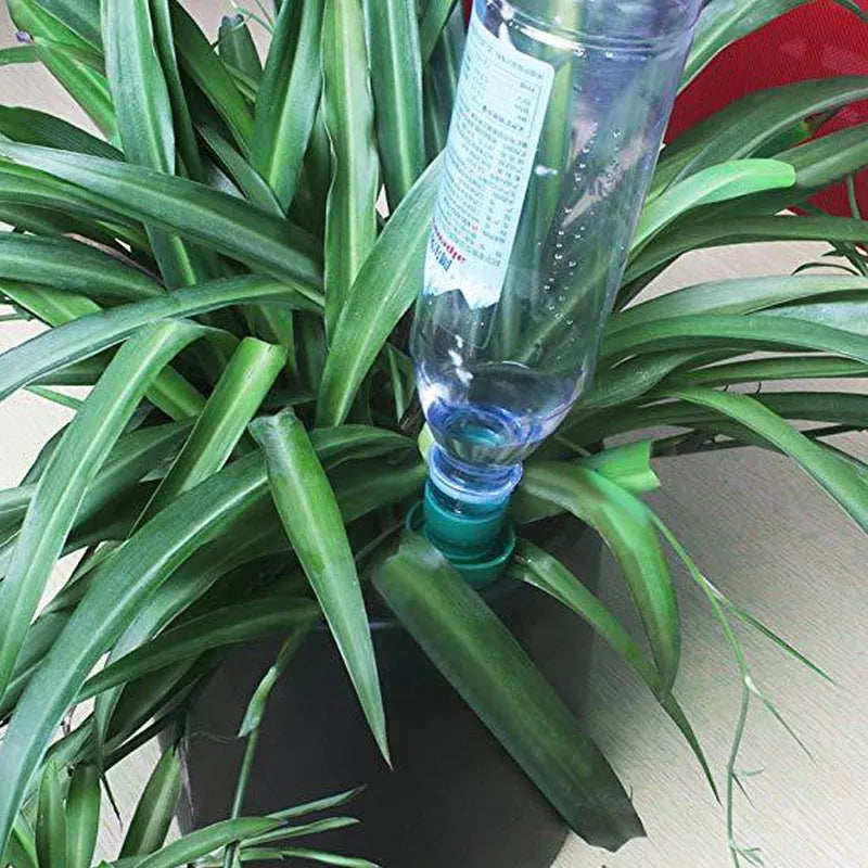 Green ceramic drip irrigation device for garden watering with cola bottle