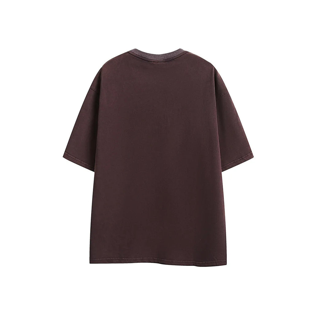 Retro loose fit embroidered t-shirt in washed cotton fabric available in purple or black colours