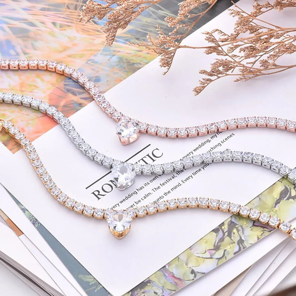 Rhinestone heart-shaped pet collar for dogs and cats in gold, platinum, and rose gold colours