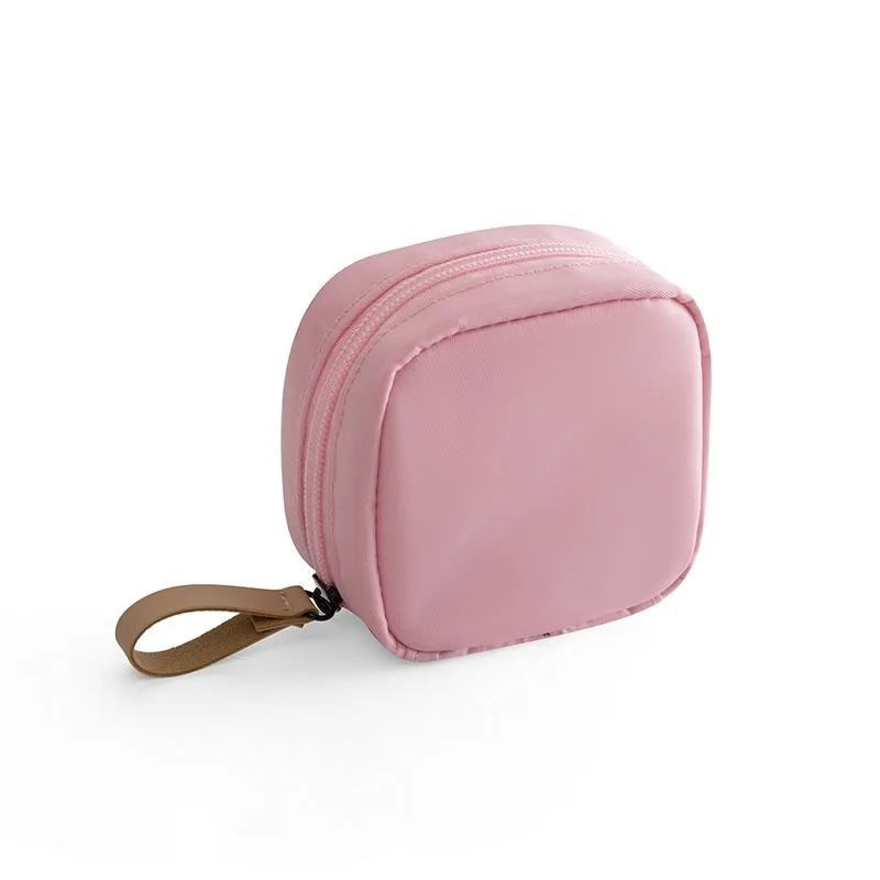 Cube shaped cloth makeup storage bag in blue, pink, white and white-pink colour options