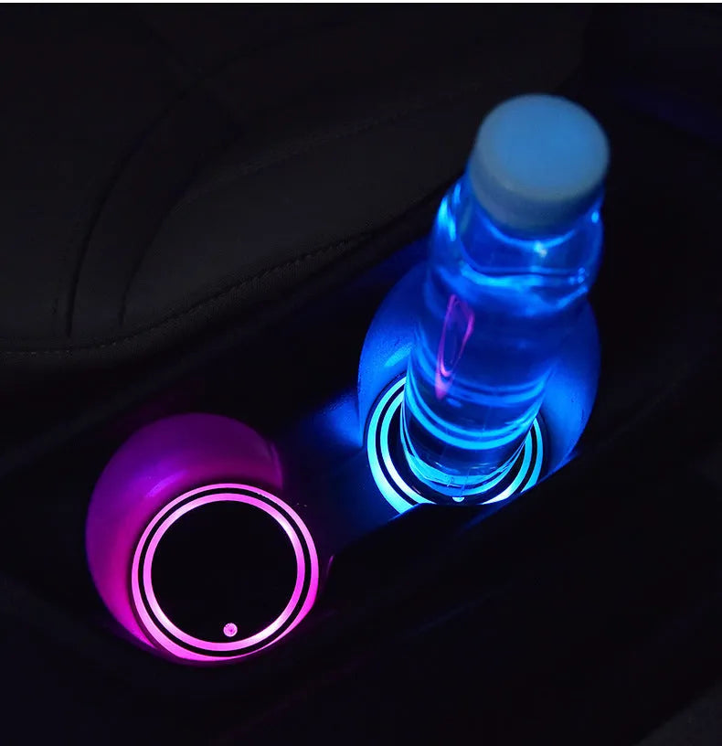 LED light up car cup holder coaster with seven colour options showing solar panel and USB charging port