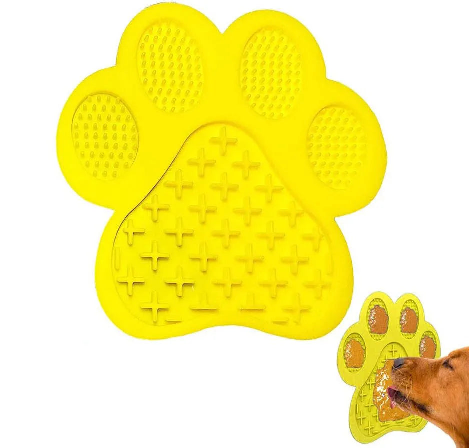 Blue silicone dog licking mat with bone texture and suction cups on back for bath time and slow feeding.