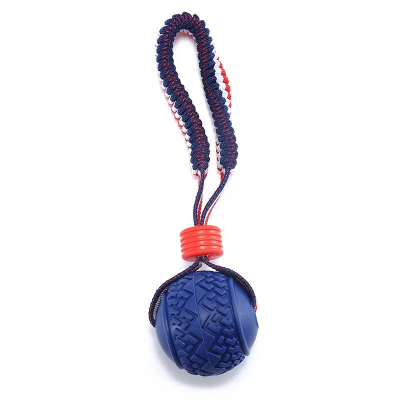 Blue rubber dog ball with rope handle for tug-of-war and teeth cleaning