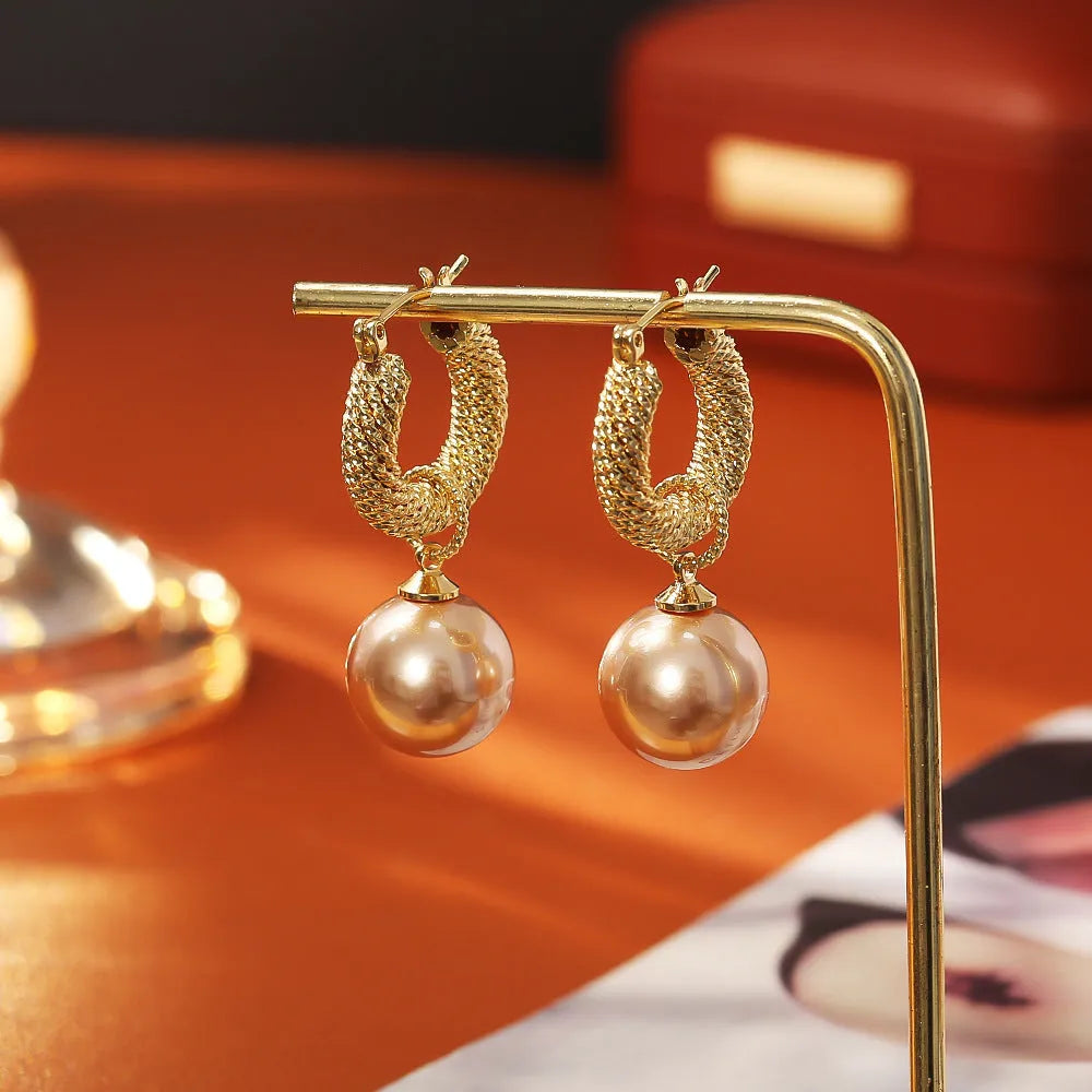 Geometric round copper earrings with real gold plating in white colour for women