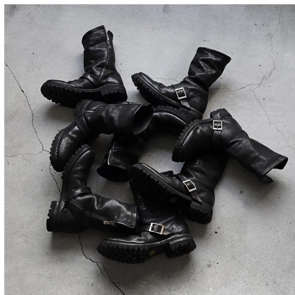 Men's black retro Martin ankle boots with a side zip and round toe.