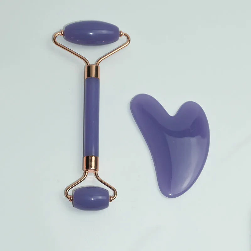Stainless steel facial massage board set with heart-shaped design and scraping plate